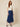 SR371 navy blue V pants three-quarter view on model - V waistband, welt pocket with flap panel, crinkled fabric