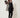 2354001 SILK DRESS TOP BLACK - three-quarter view on model, sheer open-front top with pleated satin cuff