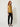 RM1819 RM Yellow Long Top - three-quarter front view on model, peplum hem and gold cord bow at the front waist