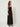 RM1519 brown venus dress - three-quarter view on model, strapless brown velvet gown with black lace waist panel and floor-length skirt
