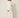 Three Piece Set White - cream tweed blazer, sequin floral vest and long skirt, three-quarter view on model