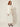Three Piece Set White - cream tweed blazer, sequin floral vest and long skirt, three-quarter view on model