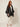 Wavy Floral Cover on model - three-quarter view showing the open front, satin band, wide kimono sleeve with satin cuff and wavy hem