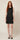 0133868 above-knee model side walking - black embossed leaf-vein dress