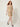 Model walking three-quarter view - Mam Luna Sana Yellow-Purple Dress