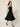 Paria Black Dress - walking on model