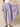 SR394 LILAC ABSHAR PANTS - detail view of the flat waistband, pleats and waterfall drape panel held out