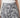SR TL Edge Pants - close-up detail of the flat front waistband, front fly seam and grey tropical leaf print