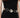01333364 CHAIN CIRCLE BELT SILVER - detail view of the ribbed sunburst discs and open rings at the waist