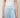 SR Light Blue Pants - detail of the flat curved front yoke, piped seam and pleats