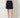 0133301310 Diba Navy Skirt — waistband and panel seam detail on model
