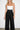 600870 Rise Pants Black — model/04-detail.jpg