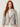 RM1832 gray and gold jacquard cropped jacket detail on model, notched lapel with gold piping, print and front slit with taupe lining