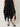 Black palazzo pants — silver stud handkerchief hem detail