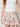 White cherry-blossom mini skirt - waistband and scallop hem detail