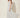 White Polka-Dot Halter Pleated Maxi Dress – three-quarter view