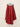 Red Edge Pant on hanger, front view, flat front waistband and draped asymmetric edge side panels