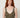 Olive shimmer knit top - close-up of floral applique straps and V-neckline