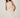 Elegant Draped Twist Mini Dress – Beige
