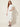 Basic Wrap Pleated Skirt White – three-quarter view
