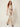 SR365 champagne jumpsuit walking