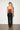 Burgundy Scarlet Corset — back view on model showing the satin ribbon lace-up with silver eyelets