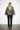 Maya Green Crocodile Coat — back view on model showing the tapestry jacquard pattern