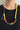 Toopi Gol Necklace — worn close-up showing the medallions at the front and the side tassel