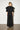 Black-GL Vest and Pants Set — back view on model showing the crystal neckline and cape layer