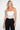 White Draped Corset — close-up of the ruched satin bust and lace boning detail on model