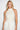 Endo Milk Overall — close-up of the cream floral lace bodice and halter collar on model