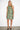 Lona Gray Abron Dress — close-up of the teal and mustard floral brocade on model