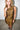 Panta Brown Leopard Print Dress — close-up of the draped cowl collar and leopard print on model
