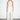 Endo Milk Overall — front view on model showing the lace bodice, halter collar and sash belt