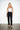 White Draped Corset — front view on model showing the ruched satin bust and sheer lace boned body