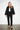 Elsa Rish Patineh Black Coat — front view on model showing the crinkled jacquard texture and open front