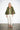 Maya Green Moth Coat — cropped olive brocade swing coat with large lime-green moth and floral print, open front view