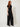 Black Front-Pleat Wide-Leg Pants - model side view