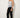 Strapless pale ice-blue and white floral lace corset, three-quarter view on model showing molded cups and boning
