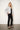 Elsa Rish Patineh White Coat — three-quarter view on model showing the cropped silhouette