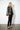 Maya Green Crocodile Coat — three-quarter view on model showing the swing silhouette and wide sleeves