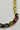 Toopi Gol Necklace — angled close-up of the medallion arc and wrapped cord