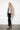 013440 Elsa Leopard Print Coat — three-quarter view showing the woven tonal leopard jacquard texture on model