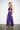 SR444 purple tropical print crop top and palazzo pants set, three-quarter view on model