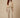 Kaira Beige Crinkle Jacket - model wearing open over cream camisole
