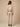 Kaira Beige Crinkle Jacket - model back view, cream top
